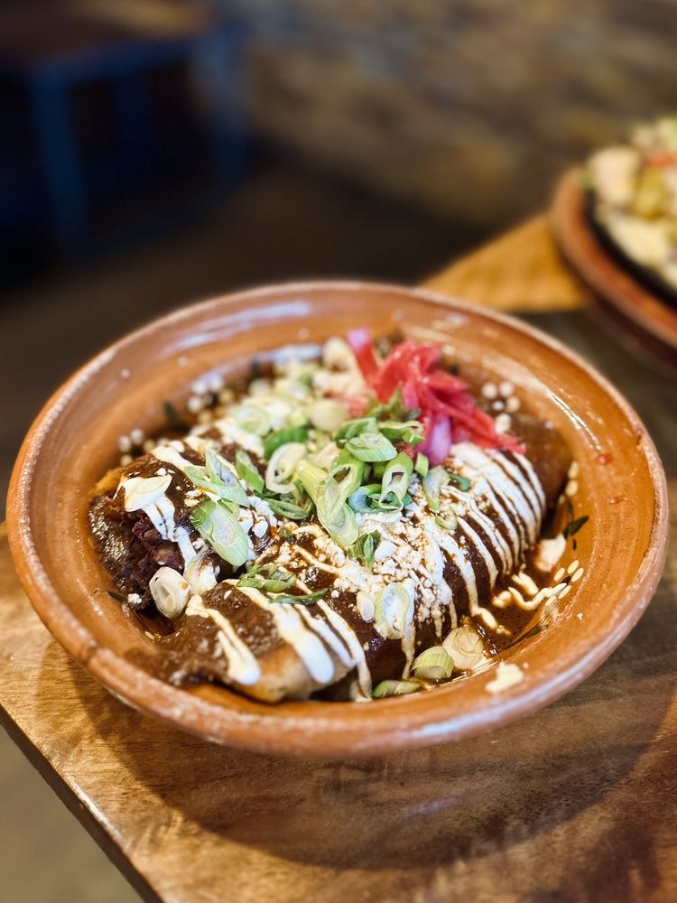 Hércules signature dish — tamales rojo